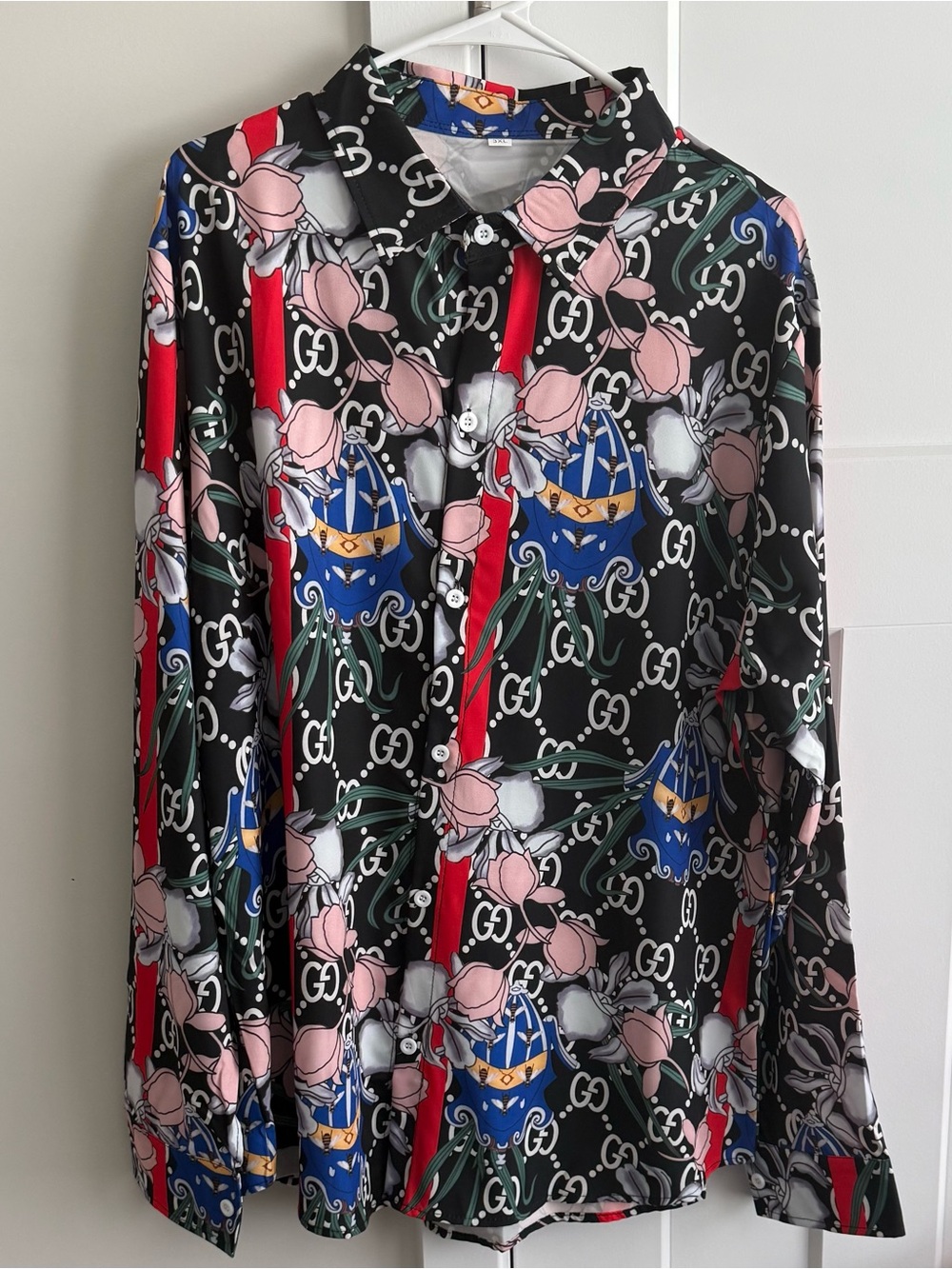 Stylish designer, G shirt XXL, new never worn.
